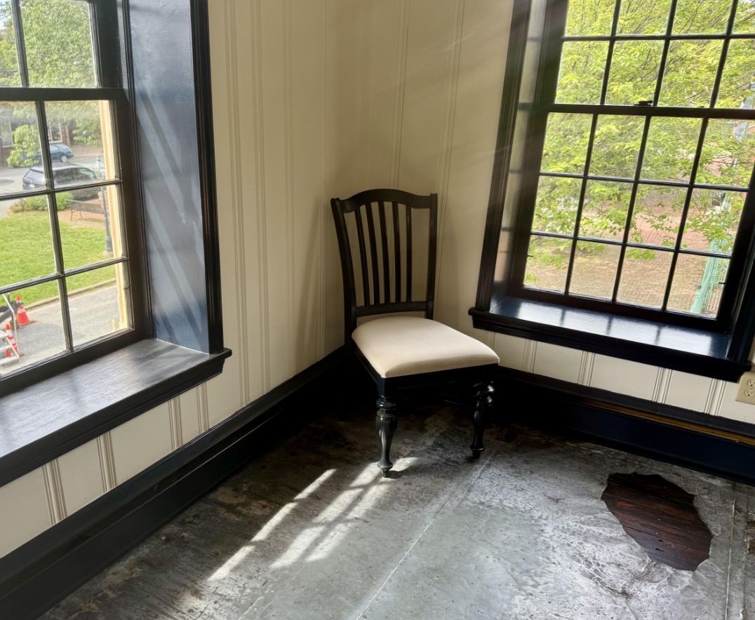 This second floor corner room in the Hippocratic Growth building once was home to the printing operations of the Kent News in the late 1800s and early 1900s. Its wooden floor was lined with lead sheets to protect it from molten lead used for setting type in the printing process.