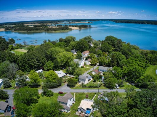 Sherwood’s historic village displays diverse architectural styles framed by mature trees and nestled around Harris Creek.